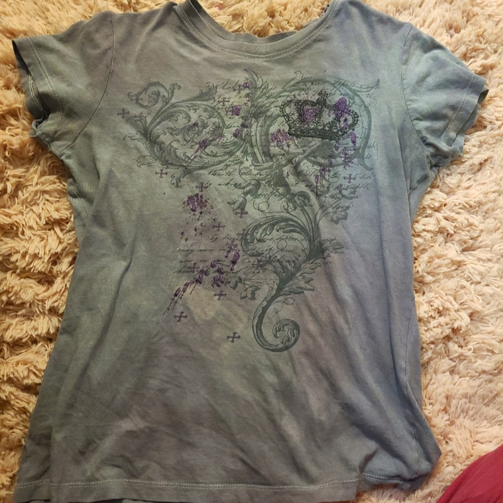 Rocker shirt with a purple hue.